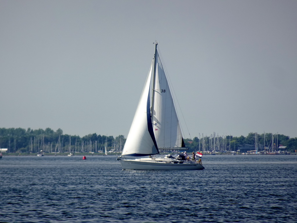 Boat on the Grevelingenmeer lake, viewed from the northwest side of the Grevelingendam