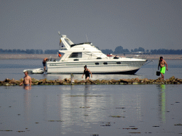 Boat in the Grevelingenmeer lake, viewed from the north side of the Grevelingendam