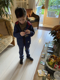 Max with Pokémon cards at his grandfather`s home