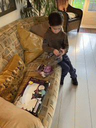 Max with Pokémon cards at his grandfather`s home