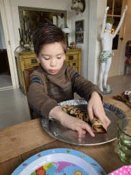 Max eating pancakes at his grandfather`s home