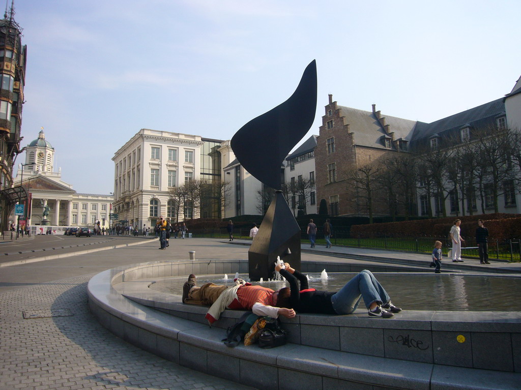 Fountain at the Mont des Arts hill and the Place Royale square with the equestrian statue of Godfrey of Bouillon and the Église Saint-Jacques-sur-Coudenberg church