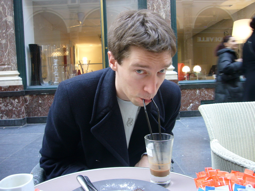 Tim having waffles and coffee at the Café du Vaudeville at the Galeries Royales Saint-Hubert