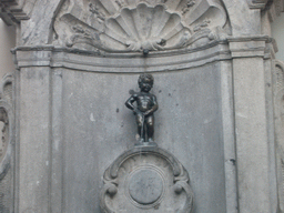 Fountain `Manneken Pis` at the crossing of the Rue de l`Étuve street and the Rue du Chêne street