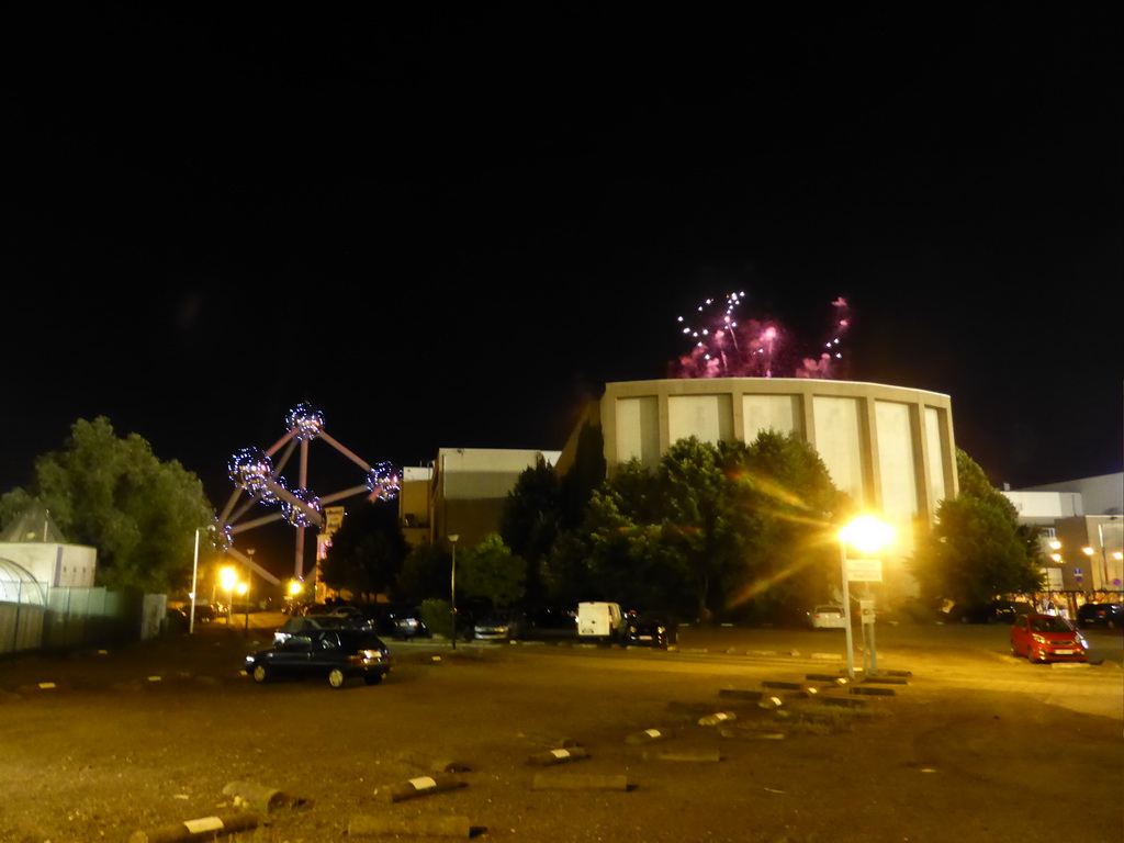 The Atomium and fireworks, viewed from near the Stade Roi Baudouin stadium, by night