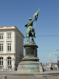The equestrian statue of Godfrey of Bouillon at the Place Royale square, the tower of the City Hall and the Basilique du Sacré-Coeur de Bruxelles church