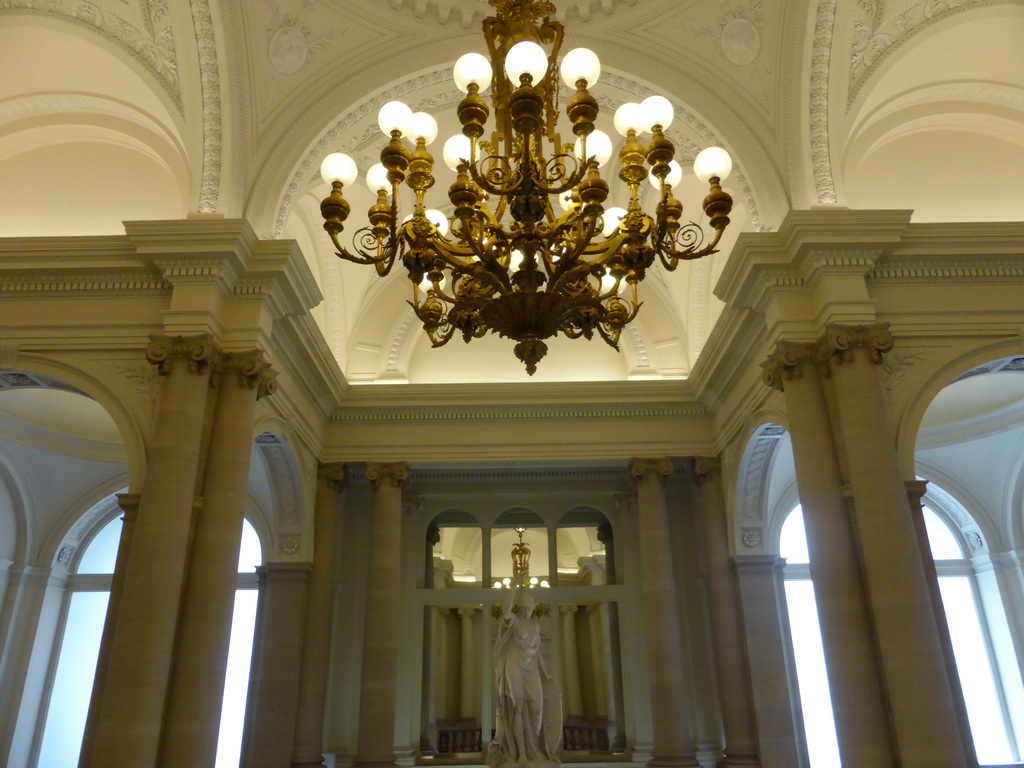 Statue of Minerva and chandeleer at the Grand Staircase of the Royal Palace of Brussels