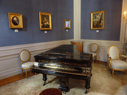 Piano and paintings in the Louis XVI Room of the Royal Palace of Brussels