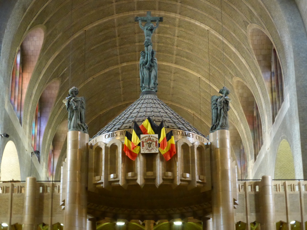 Statues and flags on top of the altar at the Basilique du Sacré-Coeur de Bruxelles church