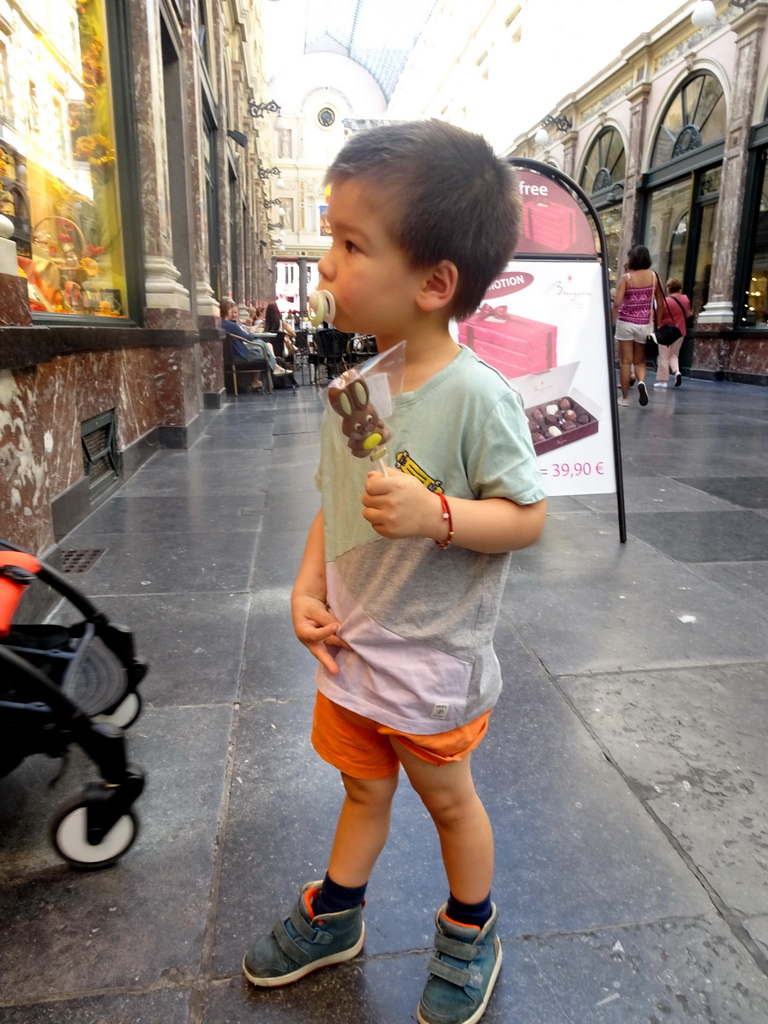 Max with a lollipop at the Galeries Royales Saint-Hubert shopping arcade