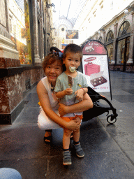 Miaomiao and Max with a lollipop at the Galeries Royales Saint-Hubert shopping arcade