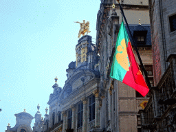 Facade with equestrian statue of a building at the south side of the Grand Place square