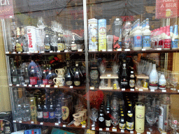 Beer bottles and glasses in the window of the Brussels Corner store at the Rue de l`Etuve street