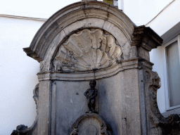 Fountain `Manneken Pis` at the crossing of the Rue de l`Étuve street and the Rue du Chêne street