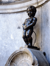 Fountain `Manneken Pis` at the crossing of the Rue de l`Étuve street and the Rue du Chêne street