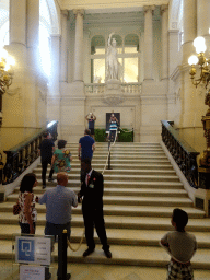 The Grand Staircase of the Royal Palace of Brussels with a statue of Minerva