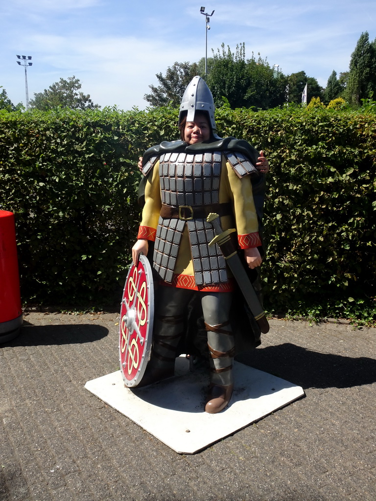 Miaomiao with a Viking statue at the Mini-Europe miniature park