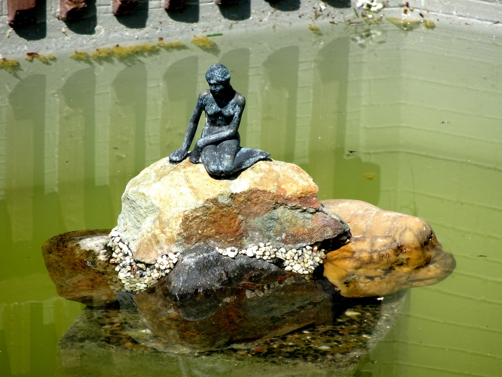 Scale model of the statue `The Little Mermaid` of Copenhagen at the Denmark section of the Mini-Europe miniature park