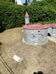 Scale models of the Great Coastal Gate and the Fat Margaret tower of Tallinn at the Estonia section of the Mini-Europe miniature park, with explanation