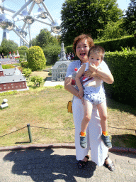 Miaomiao and Max in front of the scale model of the Maastricht City Hall at the Netherlands section of the Mini-Europe miniature park and the Atomium