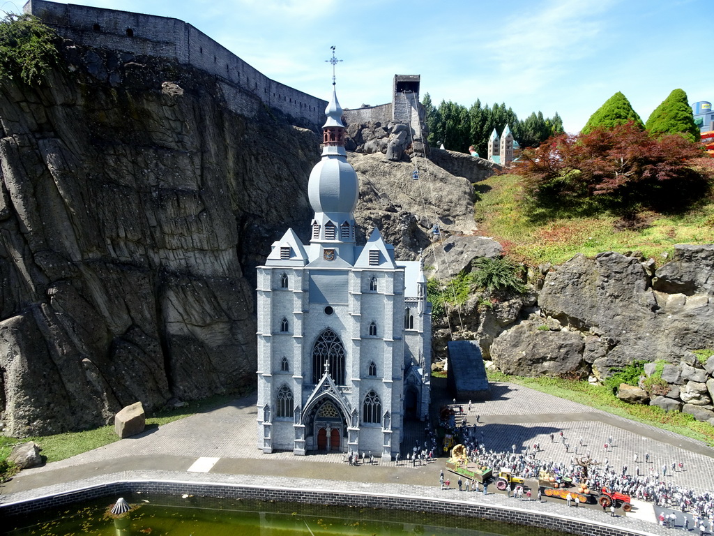 Scale models of the Notre Dame de Dinant church and the Dinant Citadel at the Belgium section of the Mini-Europe miniature park and the Atomium