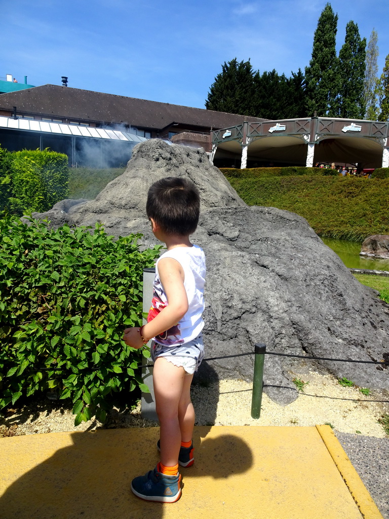 Max with a scale model of Mount Vesuvius at the Italy section of the Mini-Europe miniature park