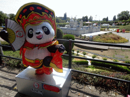 Giant Panda statue at the northeast side and a scale model of the Royal Site of San Lorenzo de El Escorial at the Spain section of the Mini-Europe miniature park