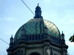 The dome of Saint Mary`s Royal Church, viewed from the car on the Rue des Palais street