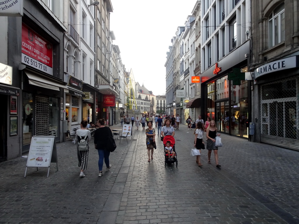 Miaomiao, Max and Miaomiao`s mother at the Rue des Fripiers street, at sunset