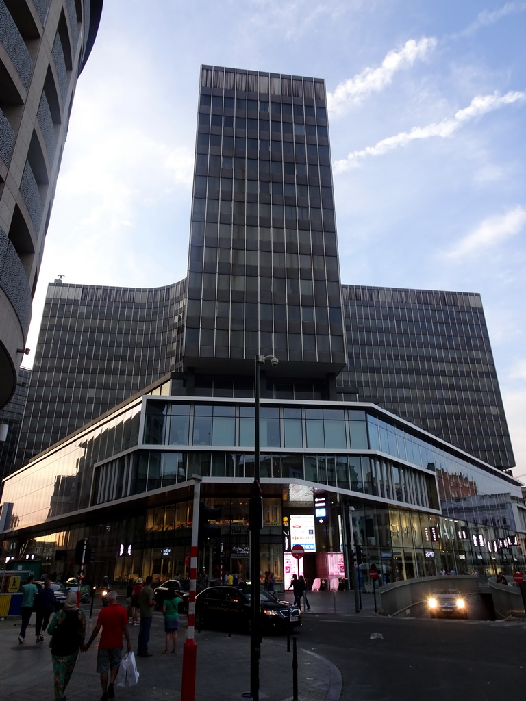 Building at the west side of the Place de la Monnaie square, at sunset