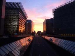 The Rue de la Loi street with the Europa, Lex, Charlemagne and Berlaymont buildings of the European Commission, viewed from the Schuman Roundabout, at sunset