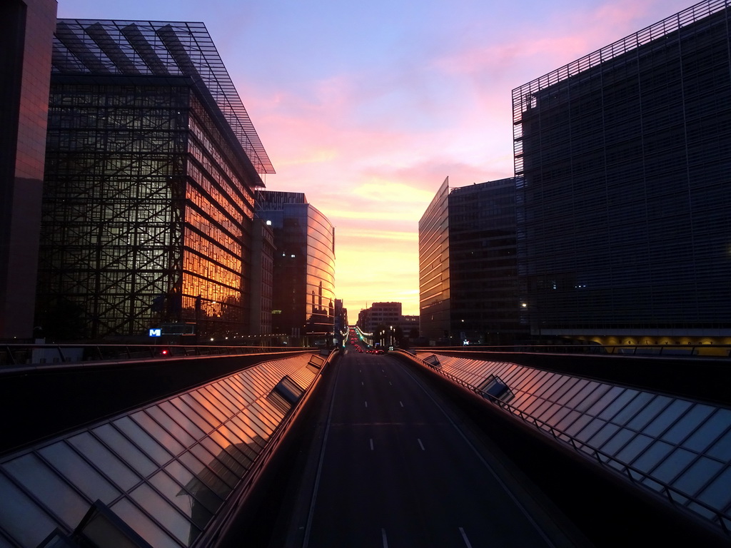 The Rue de la Loi street with the Europa, Lex, Charlemagne and Berlaymont buildings of the European Commission, viewed from the Schuman Roundabout, at sunset