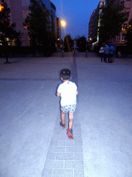 Max at the Rue de la Loi street, by night