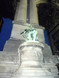 Statue at the front of the Arcade du Cinquantenaire arch at the Cinquantenaire Park, by night