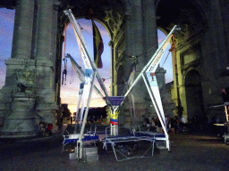 Bungee Trampoline at the back side of the Arcade du Cinquantenaire arch at the Cinquantenaire Park, by night