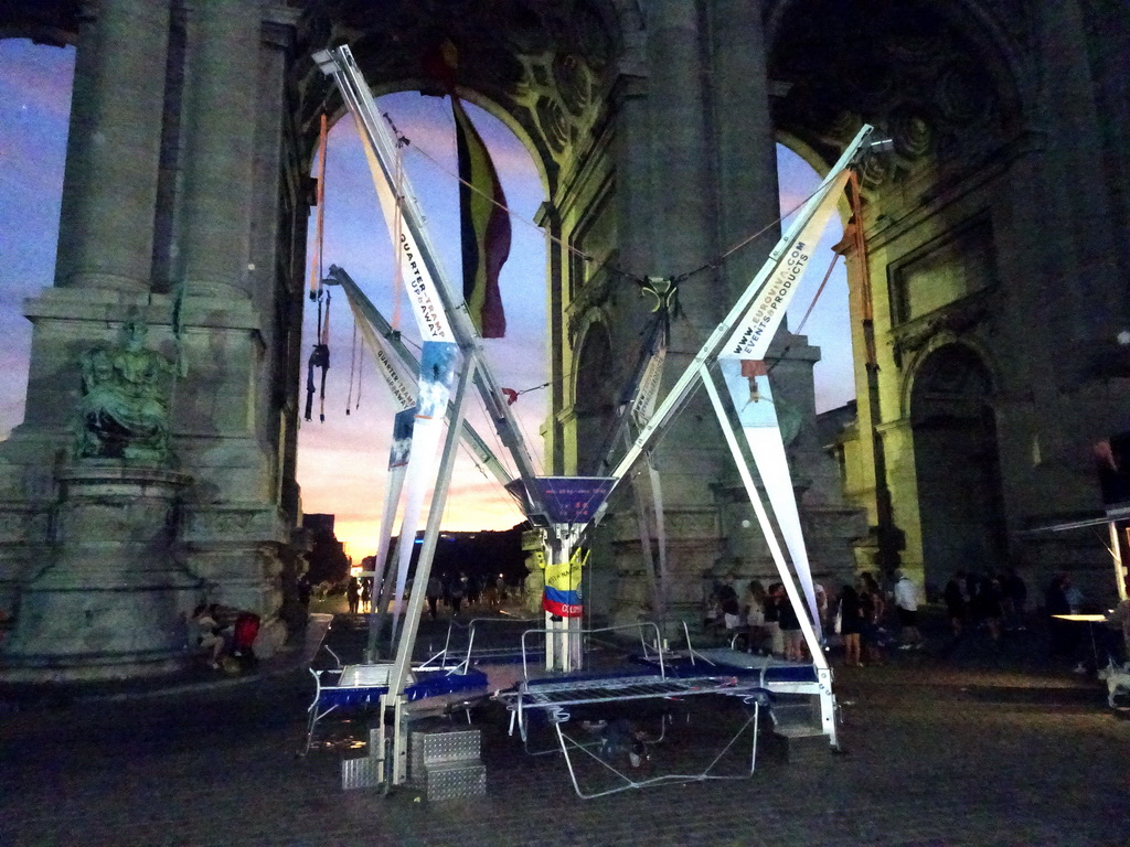 Bungee Trampoline at the back side of the Arcade du Cinquantenaire arch at the Cinquantenaire Park, by night