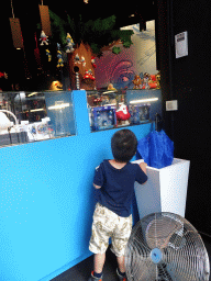 Max at the Smurf Store at the Rue du Marché Aux Herbes street