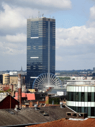 The city center with a ferris wheel and the Tour du Midi tower, viewed from the Place Poelaert square