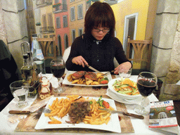 Miaomiao having dinner in an Italian restaurant `La Porta di Taormina` in Vaci Utca street