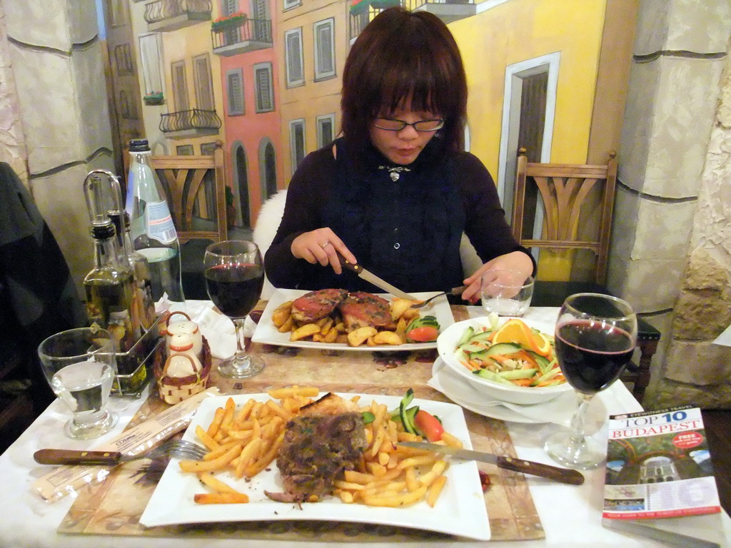 Miaomiao having dinner in an Italian restaurant `La Porta di Taormina` in Vaci Utca street