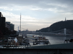 The Elisabeth Bridge (Erzsébet Bridge) over the Danube river and the Liberty Statue (Szabadság Szobor), viewed from the Széchenyi Chain Bridge