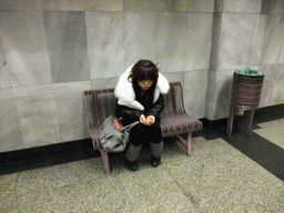 Miaomiao playing a beggar in a subway station
