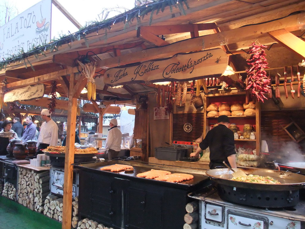 Food stand at the christmas market at Vörösmarty Tér square