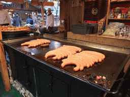 Food stand at the christmas market at Vörösmarty Tér square