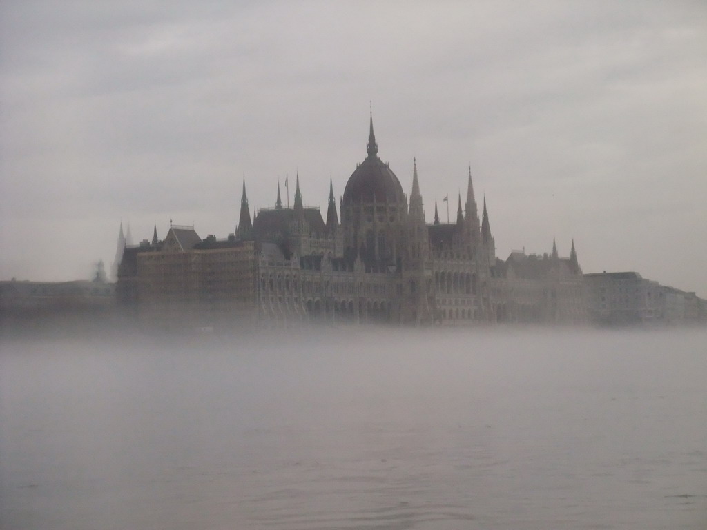 The Hungarian Parliament Building in the myst, from the cruise boat on the Danube river