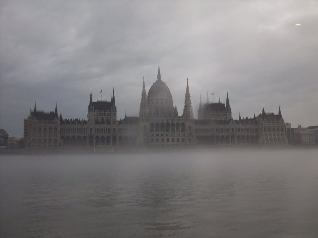 The Hungarian Parliament Building in the myst, from the cruise boat on the Danube river