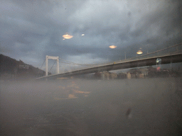 The Elisabeth Bridge and the St. Gellert Monument in the myst, from the cruise boat on the Danube river