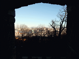 The Hungarian Parliament Building, viewed through a hole in the wall at the north side of Buda Castle Hill
