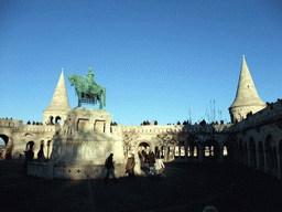 The Fisherman`s Bastion and a bronze statue of Stephen I of Hungary