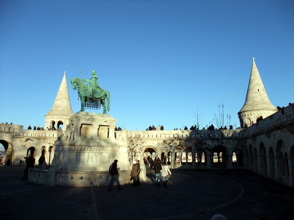 The Fisherman`s Bastion and a bronze statue of Stephen I of Hungary